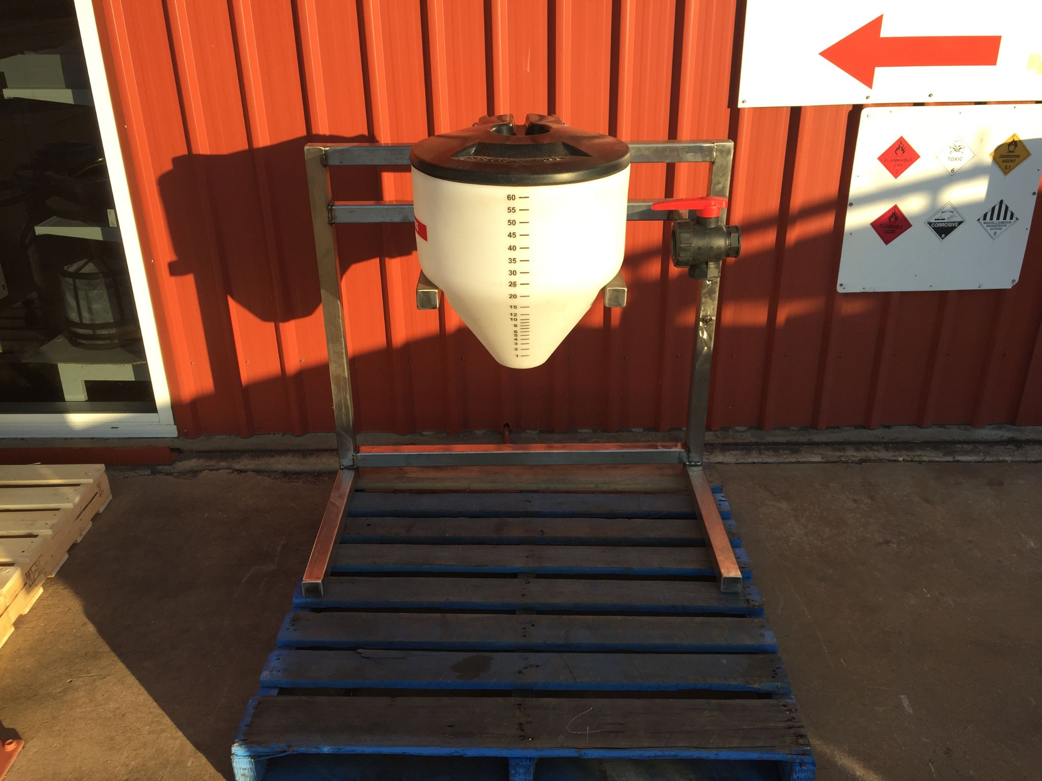 Spray calibration testing setup in Bundaberg used to measure and ensure accurate spray output for agricultural equipment.